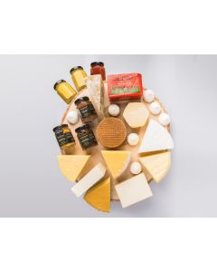 A selection of hand made welsh cheeses consisting of Caws Cerwyn, Smoked Cerwyn, Mature Cerwyn, Caws Preseli, Drewi Sant also including two goats Cheeses Heb Enw and Smoked Heb Enw a geust blue.
Also included in the hamper are some Welsh Crackers a selec
